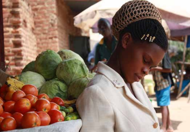 Twenty-one year-old Judith Mulaga at her shop in Iganga, Uganda. (Photo: BRAC)