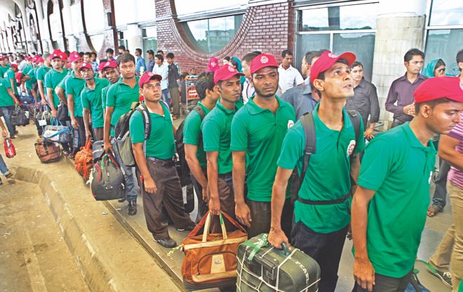 Migrant workers wait outside the Hazrat Shahjalal International Airport.