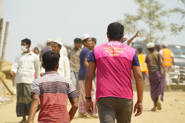 Walking through the remains of the Balukhali Rohingya camp