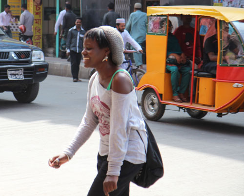 Jackie crosses the street in Barisal during one of her field visits.