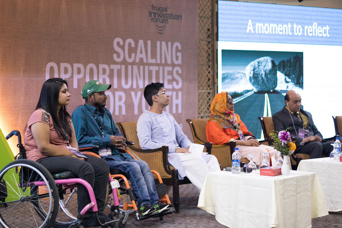 Vashkar Bhattachearjee (far right) speaking at the disability inclusion panel at this year's Frugal Innovation Forum.